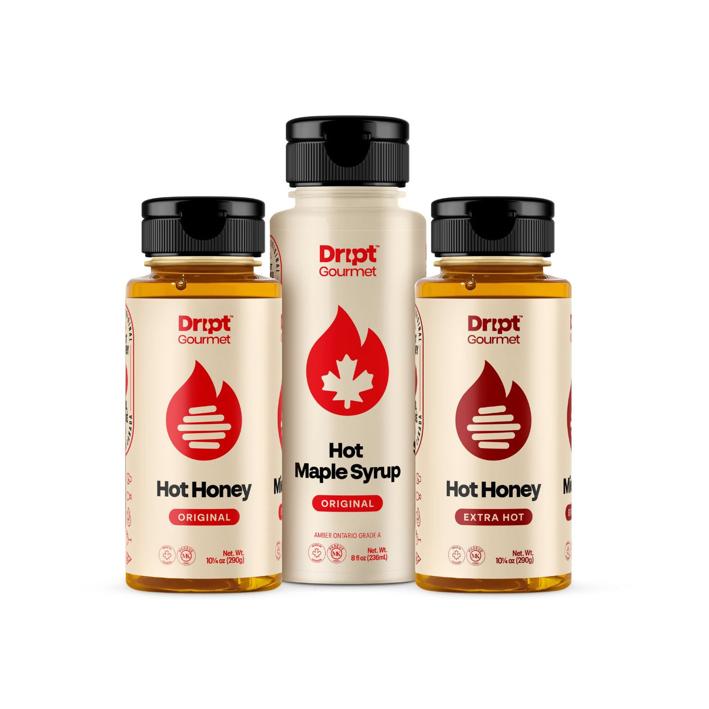 Dript Gourmet Hot box contents. Original hot honey, extra hot honey, original hot maple syrup containers to a white background.